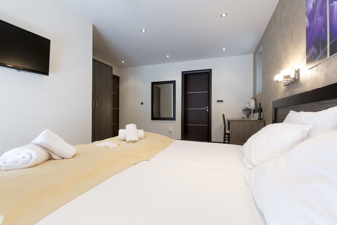 Imagen de la habitación del Hotel Villa Mystique. Foto 4