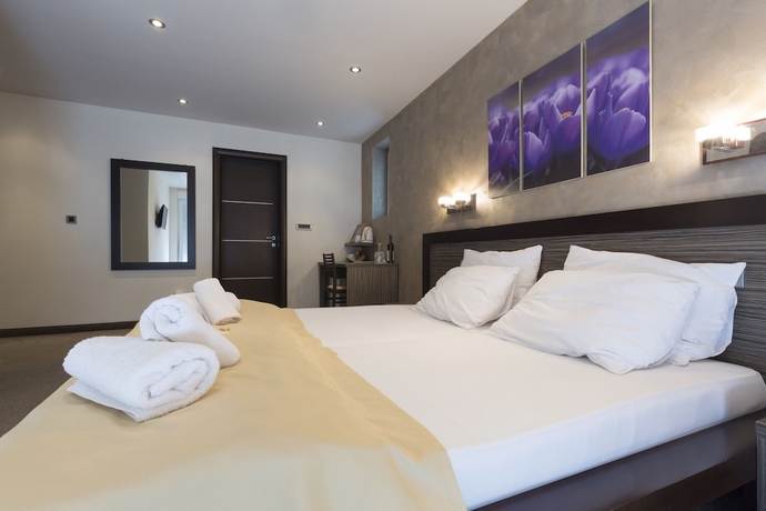 Imagen de la habitación del Hotel Villa Mystique. Foto 5