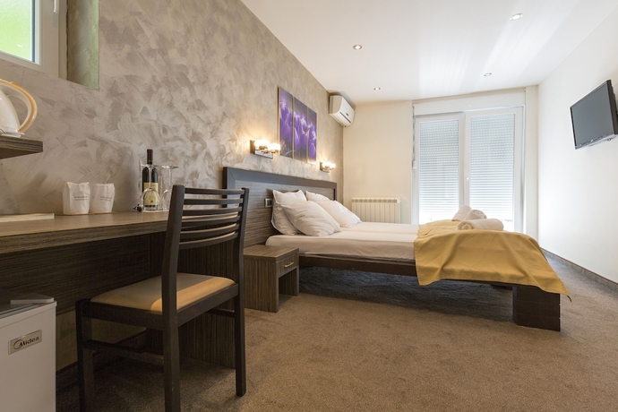 Imagen de la habitación del Hotel Villa Mystique. Foto 10