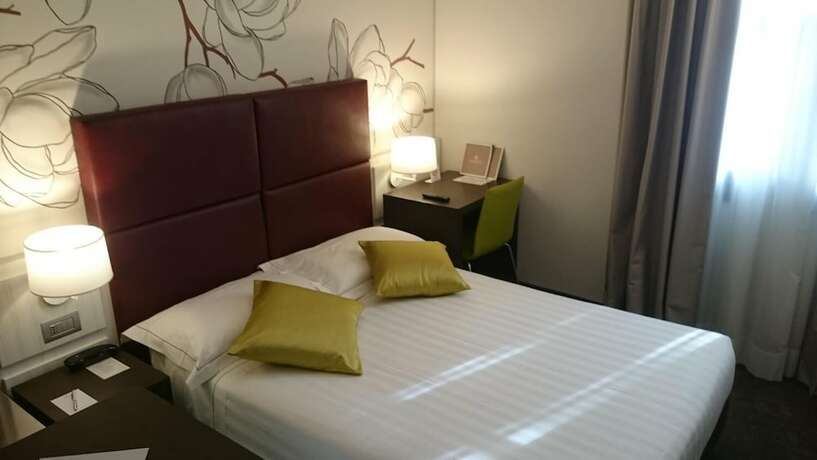 Imagen de la habitación del Hotel Villa Nabila. Foto 18