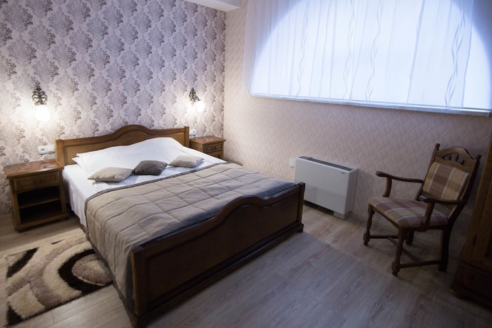 Imagen de la habitación del Hotel Villa Natali. Foto 7