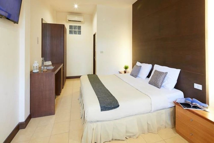 Imagen de la habitación del Hotel Villa Navin Resort. Foto 3