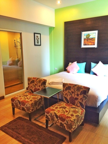 Imagen de la habitación del Hotel Villa Navin Resort. Foto 6