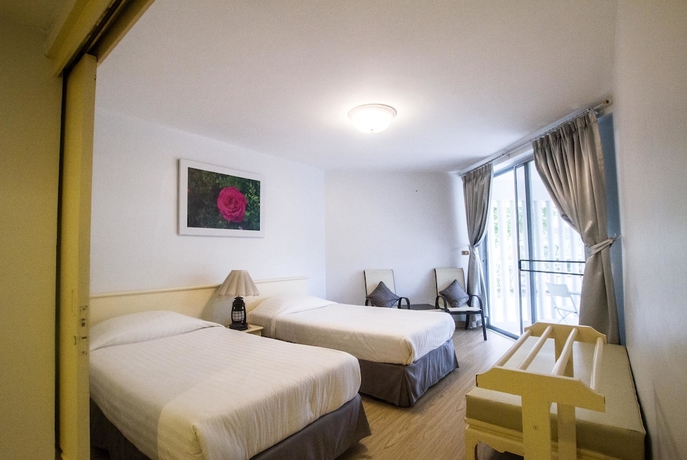 Imagen de la habitación del Hotel Villa Navin Resort. Foto 7
