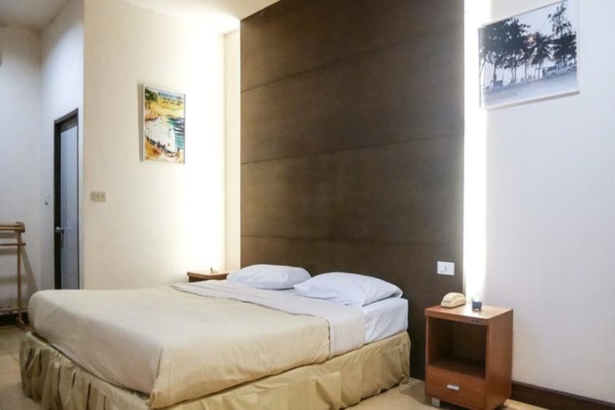 Imagen de la habitación del Hotel Villa Navin Resort. Foto 12