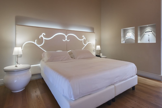 Imagen de la habitación del Hotel Villa Neri Resort and Spa. Foto 15