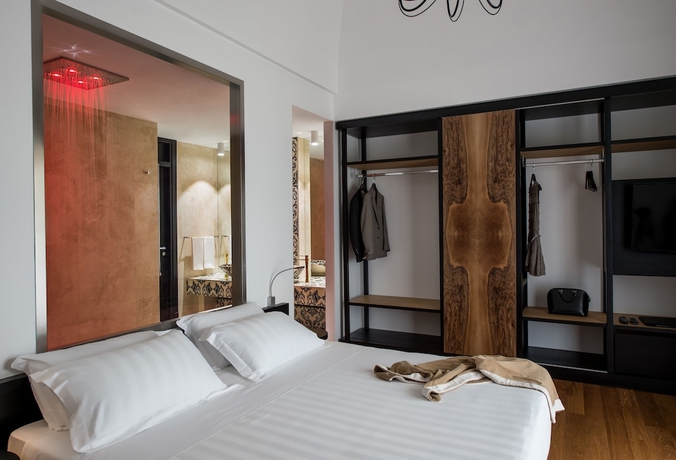 Imagen de la habitación del Hotel Villa Neri Resort and Spa. Foto 18