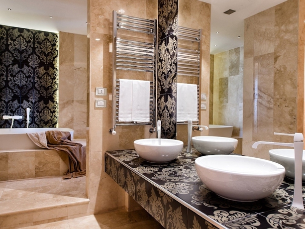 Imagen de la habitación del Hotel Villa Neri Resort and Spa. Foto 19