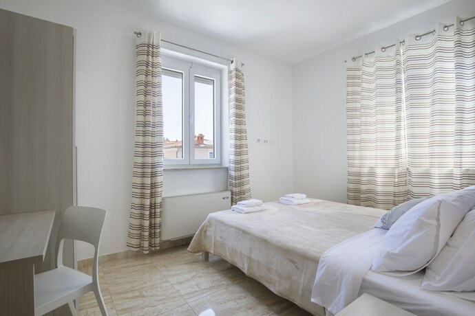 Imagen de la habitación del Hotel Villa Nina Apartments. Foto 14