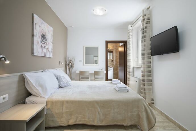 Imagen de la habitación del Hotel Villa Nina Apartments. Foto 19