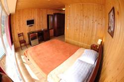 Imagen de la habitación del Hotel Villa Nova, Tatariv. Foto 89