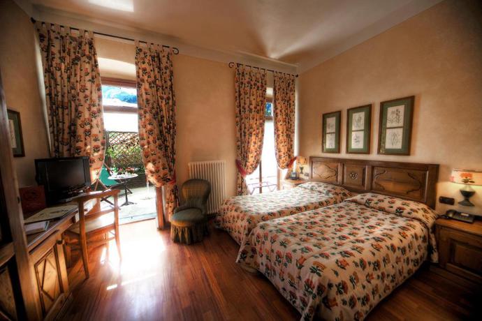 Imagen de la habitación del Hotel Villa Novecento Romantic. Foto 4