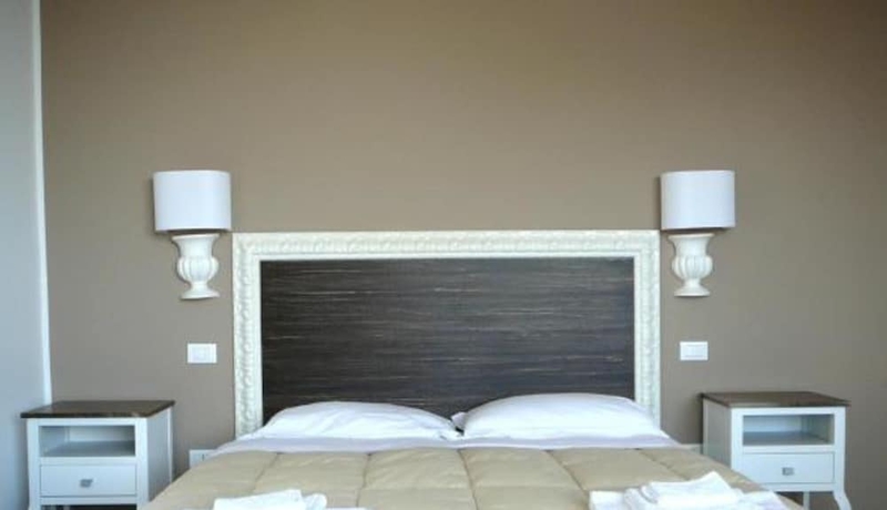 Imagen de la habitación del Hotel Villa Oasis Residence. Foto 5