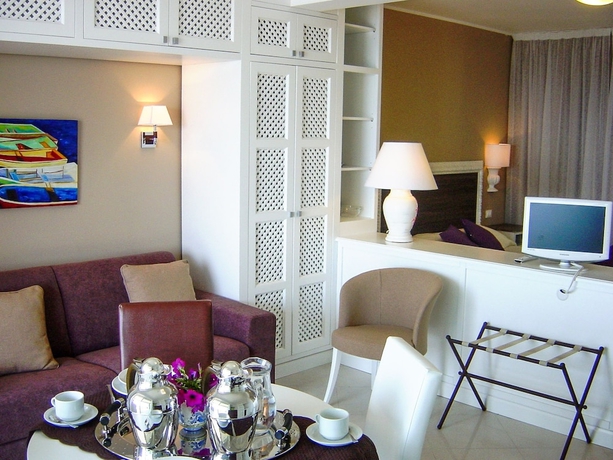 Imagen de la habitación del Hotel Villa Oasis Residence. Foto 12