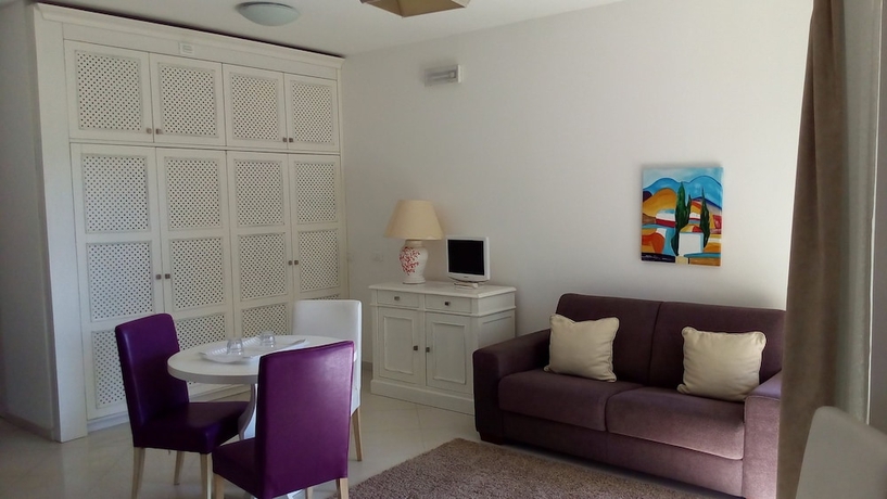 Imagen de la habitación del Hotel Villa Oasis Residence. Foto 13