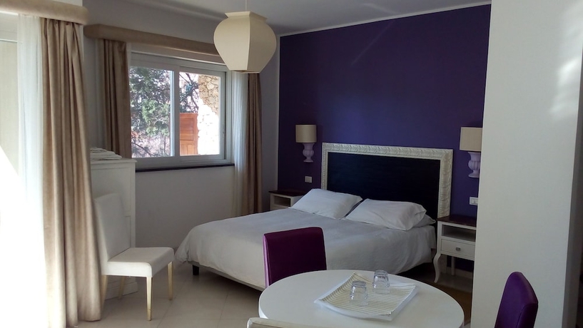 Imagen de la habitación del Hotel Villa Oasis Residence. Foto 14