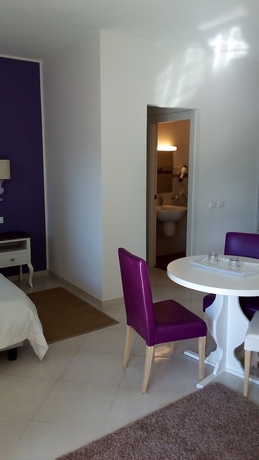 Imagen de la habitación del Hotel Villa Oasis Residence. Foto 17