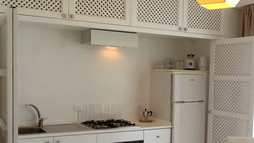 Imagen de la habitación del Hotel Villa Oasis Residence. Foto 18