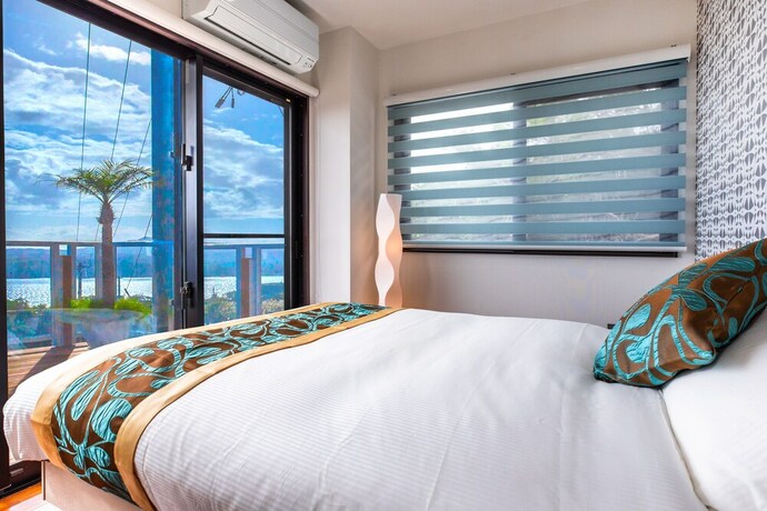 Imagen de la habitación del Hotel Villa Ocean Bridge Kourijima. Foto 21