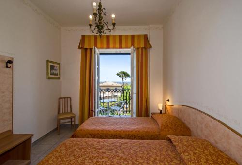 Imagen de la habitación del Hotel Villa Ombrosa, Marina Di Pietrasanta. Foto 8