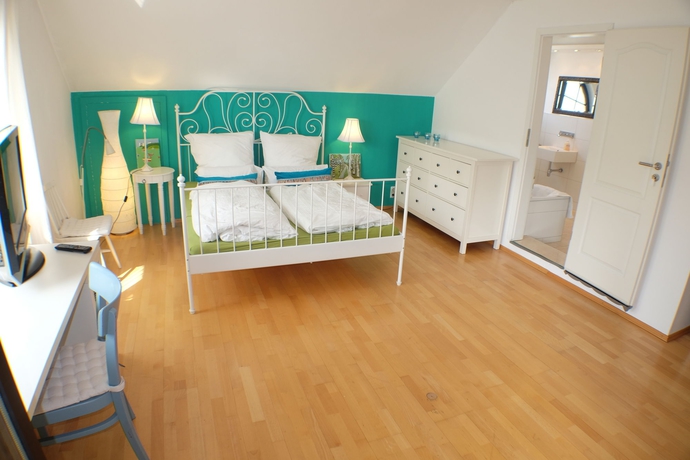 Imagen de la habitación del Hotel Villa Orchard Frankfurt. Foto 8