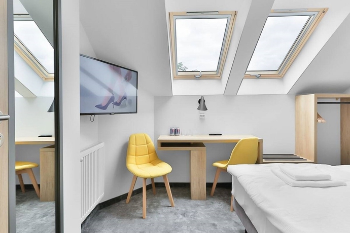 Imagen de la habitación del Hotel Villa Ozone. Foto 8