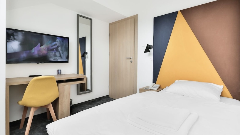 Imagen de la habitación del Hotel Villa Ozone. Foto 9