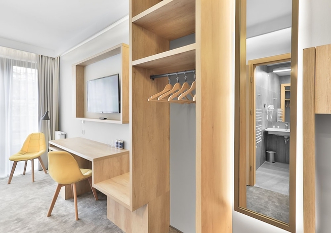 Imagen de la habitación del Hotel Villa Ozone. Foto 10