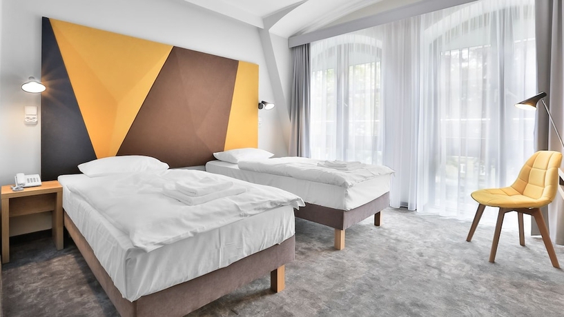 Imagen de la habitación del Hotel Villa Ozone. Foto 12