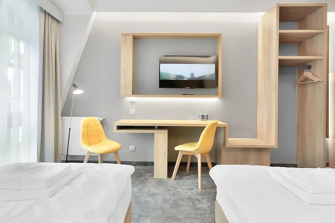 Imagen de la habitación del Hotel Villa Ozone. Foto 15