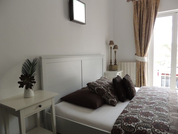 Imagen de la habitación del Hotel Villa Palmer. Foto 8