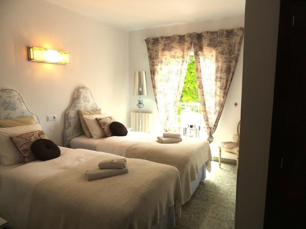 Imagen de la habitación del Hotel Villa Palmer. Foto 12