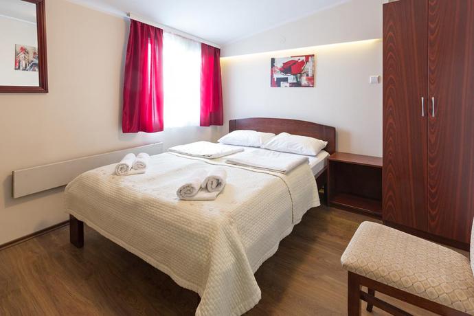 Imagen de la habitación del Hotel Villa Panorama. Foto 12