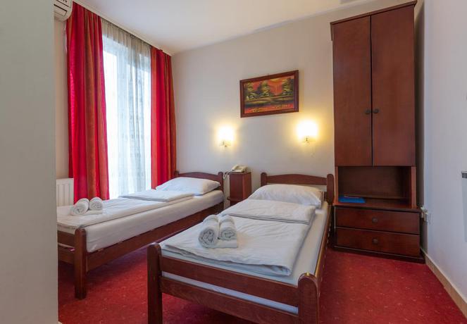 Imagen de la habitación del Hotel Villa Panorama. Foto 13