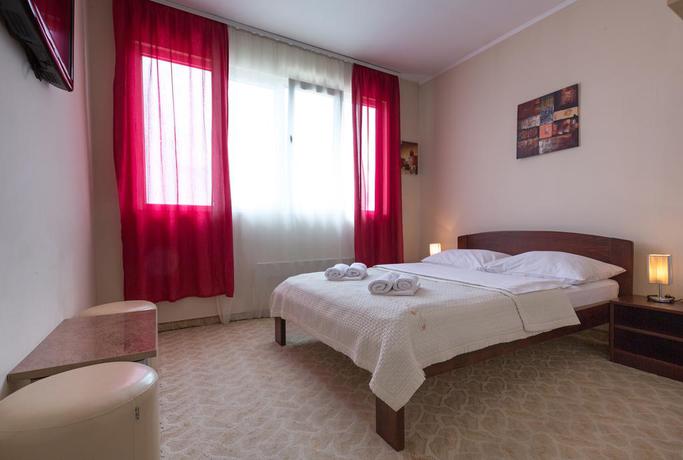 Imagen de la habitación del Hotel Villa Panorama. Foto 16