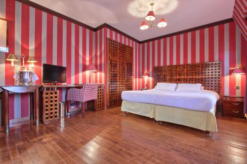 Imagen de la habitación del Hotel Villa Pantheon. Foto 18
