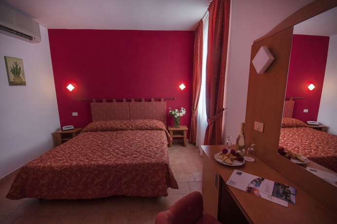 Imagen de la habitación del Hotel Villa Paradiso, Passignano Sul Trasimeno. Foto 3