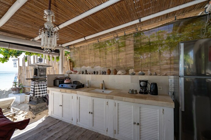 Imagen de la habitación del Hotel Villa Pasir. Foto 16