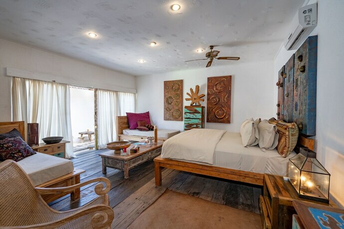 Imagen de la habitación del Hotel Villa Pasir. Foto 17