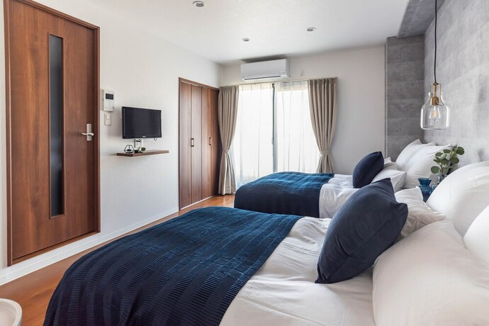 Imagen de la habitación del Hotel Villa Penthouse Tenma. Foto 28