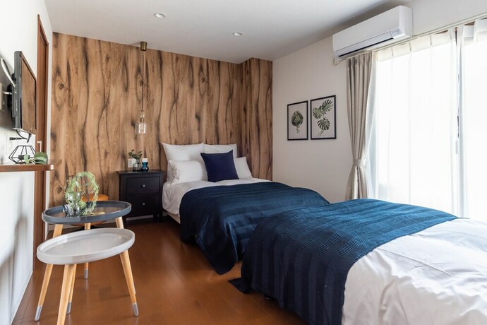 Imagen de la habitación del Hotel Villa Penthouse Tenma. Foto 37