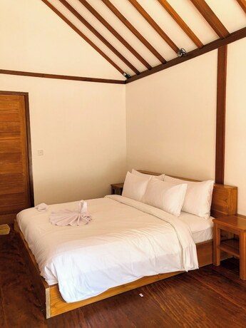 Imagen de la habitación del Hotel Villa Penyu. Foto 22