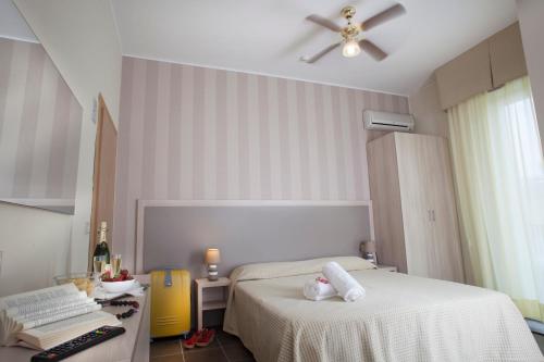Imagen de la habitación del Hotel Villa Perazzini. Foto 8