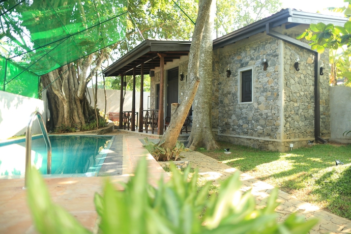 Imagen de la piscina del Hotel Villa Pinnawala And Restaurant. Foto 17