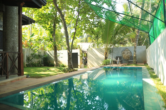 Imagen de la piscina del Hotel Villa Pinnawala And Restaurant. Foto 18