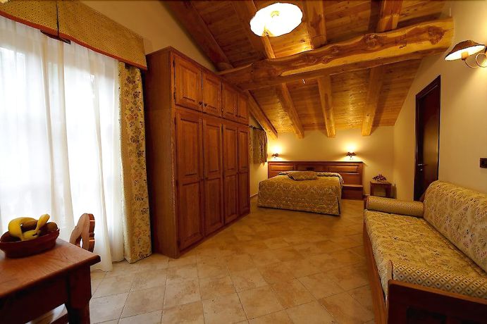 Imagen de la habitación del Hotel Villa Plinia. Foto 14