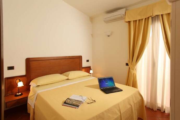 Imagen de la habitación del Hotel Villa Poggio Chiaro. Foto 16