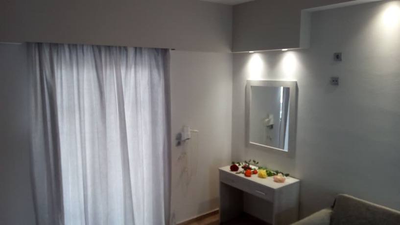 Imagen de la habitación del Hotel Villa Popi. Foto 15