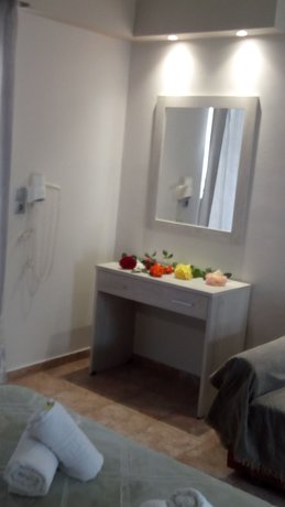 Imagen de la habitación del Hotel Villa Popi. Foto 19