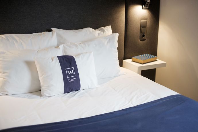 Imagen de la habitación del Hotel Villa Prime. Foto 16